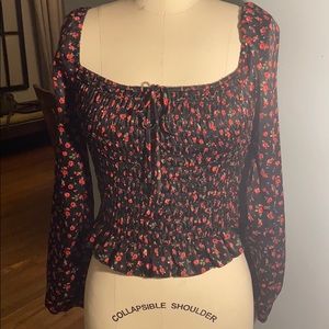 Floral Long-sleeve blouse.